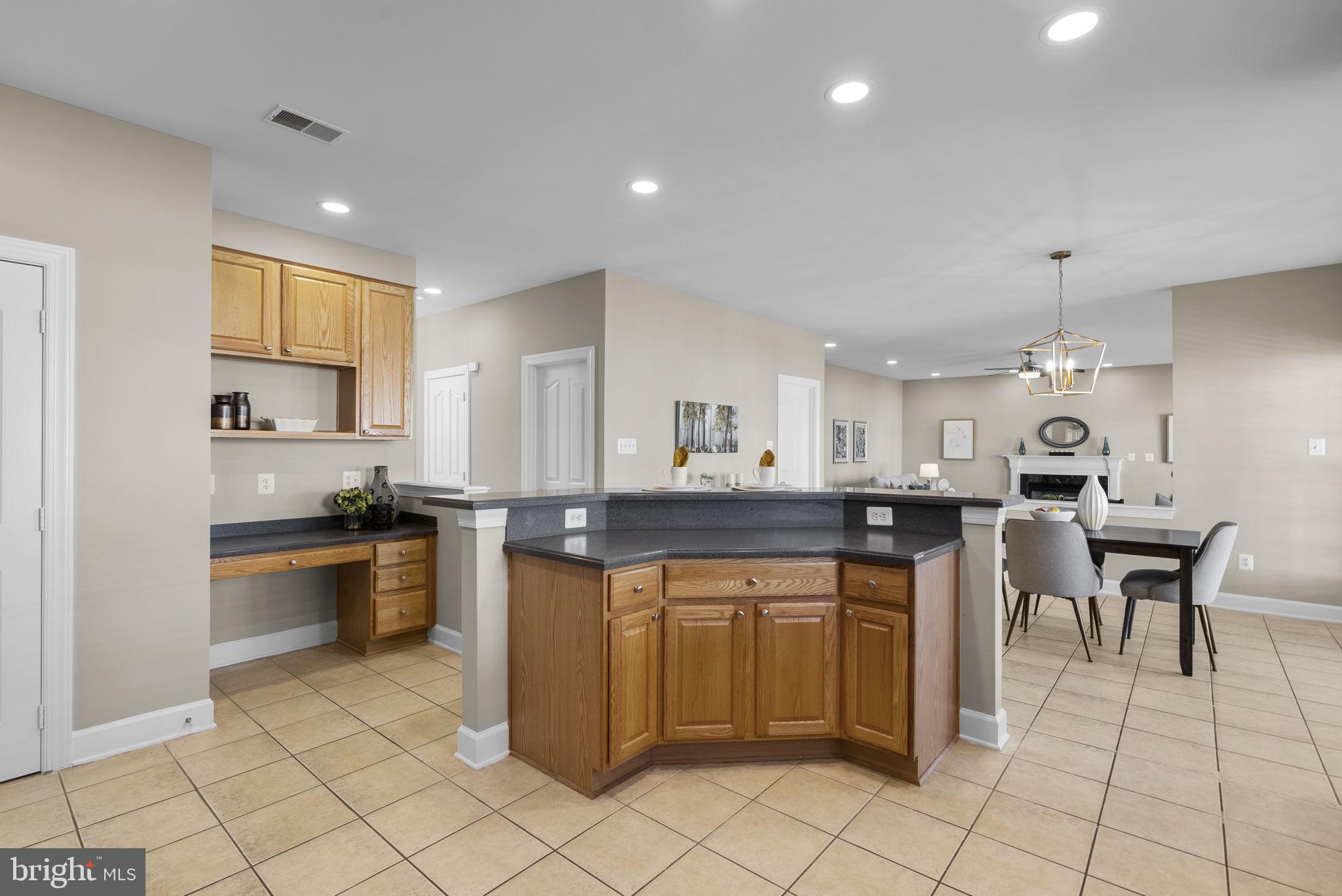 14421 Ashleigh Greene Road Boyds, MD 20841 - Photo 17 of 95 Huge Kitchen with Breakfast Bar Island