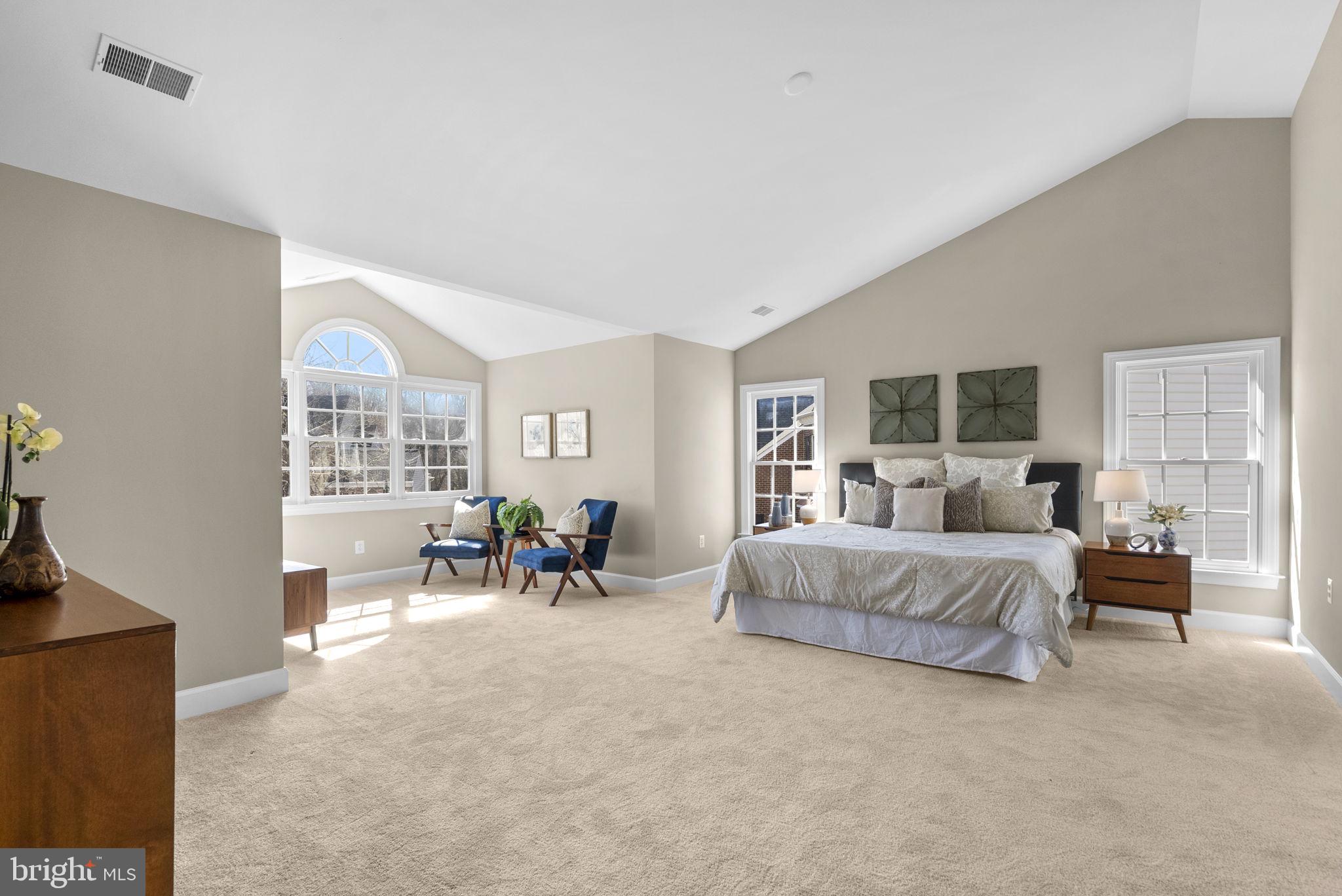 14421 Ashleigh Greene Road Boyds, MD 20841 - Photo 35 of 95 a bedroom with furniture and a large window