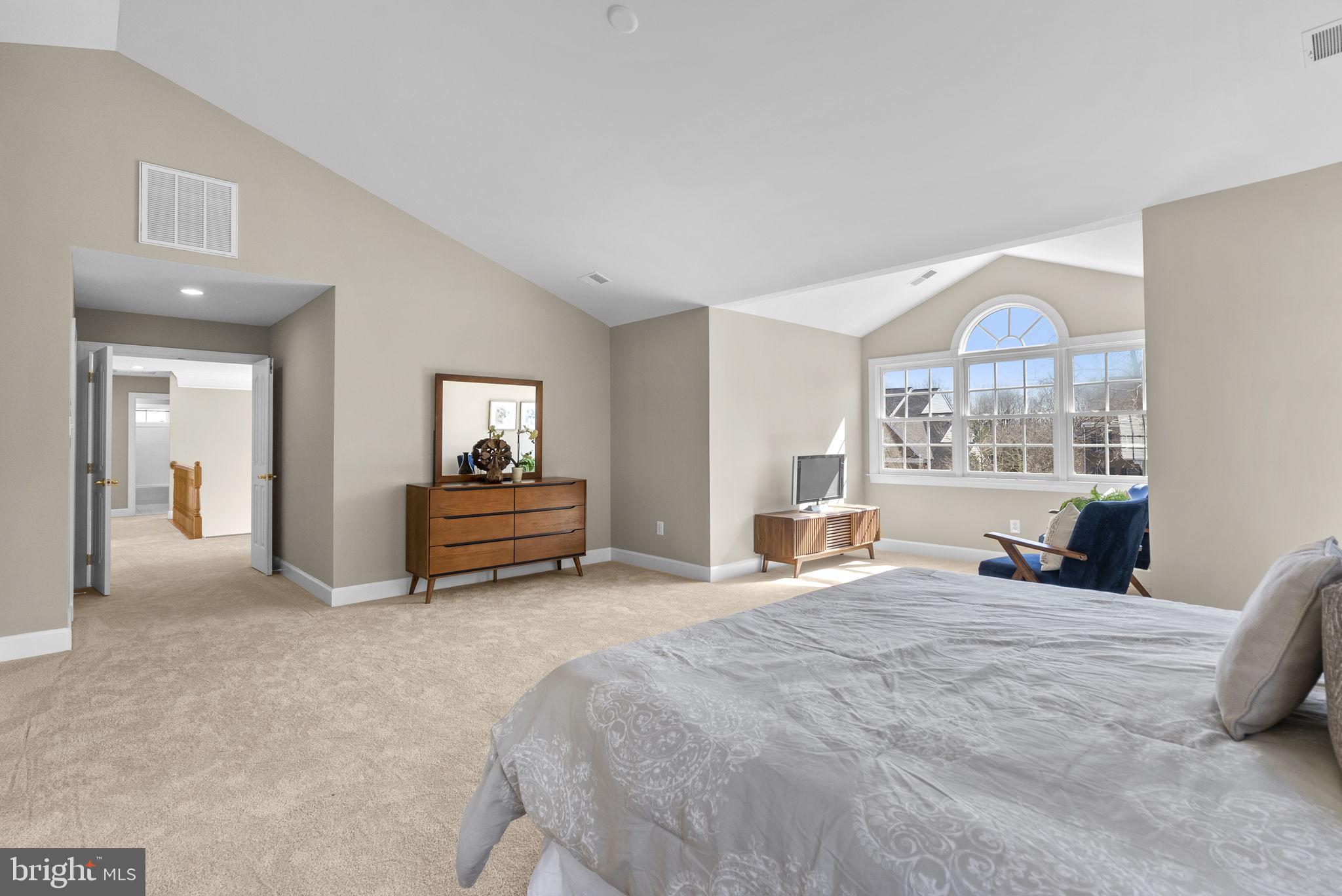 14421 Ashleigh Greene Road Boyds, MD 20841 - Photo 38 of 95 a bed room with a bed and a large window