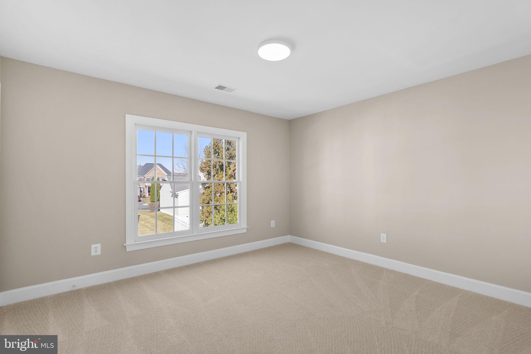 14421 Ashleigh Greene Road Boyds, MD 20841 - Photo 48 of 95 an empty room with a window