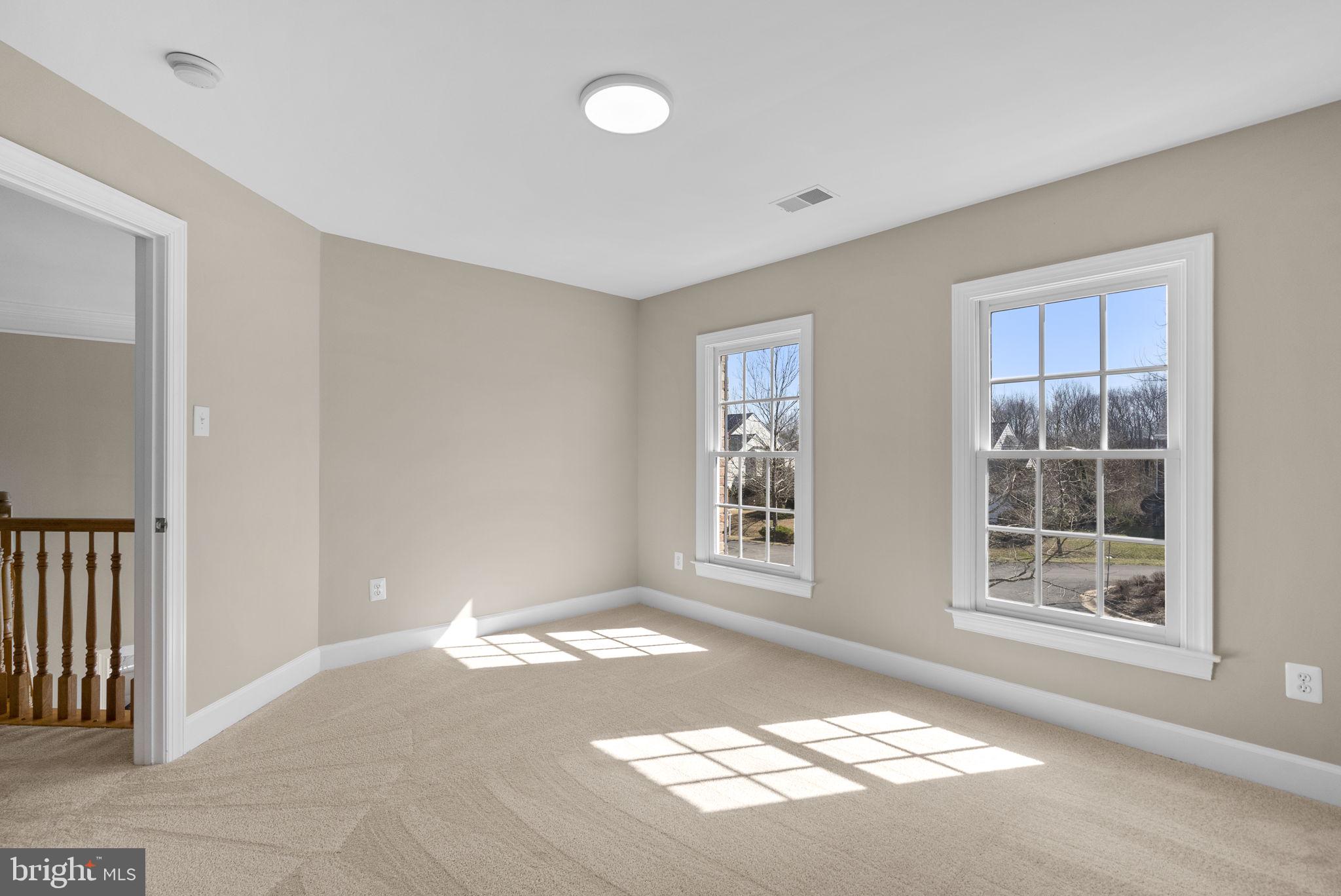 14421 Ashleigh Greene Road Boyds, MD 20841 - Photo 56 of 95 a view of empty room with windows