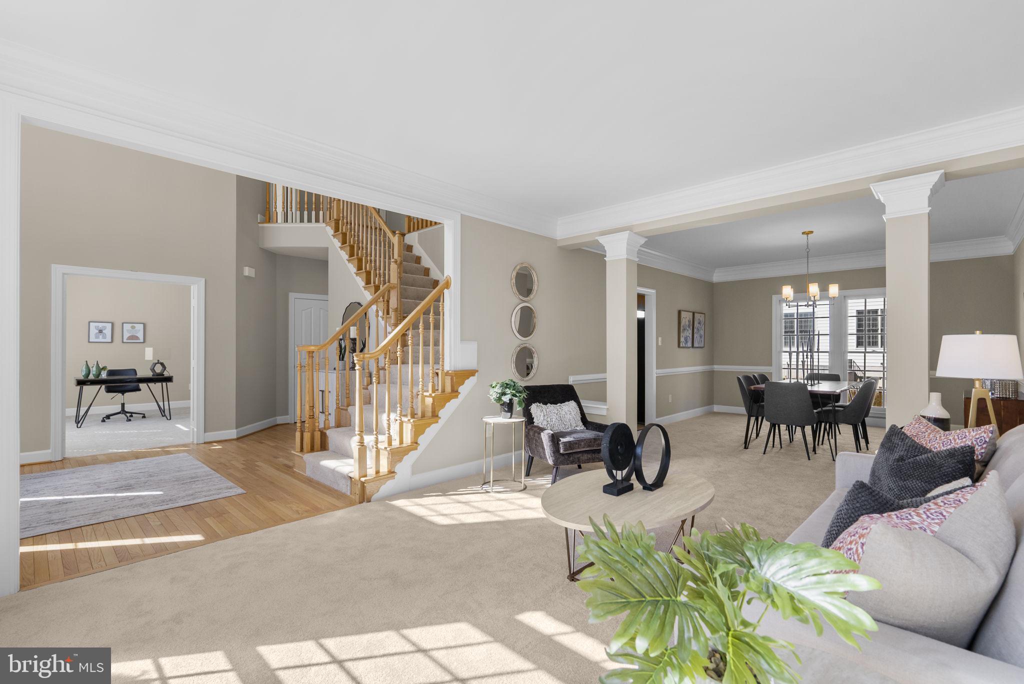 14421 Ashleigh Greene Road Boyds, MD 20841 - Photo 6 of 95 a living room with furniture and a table