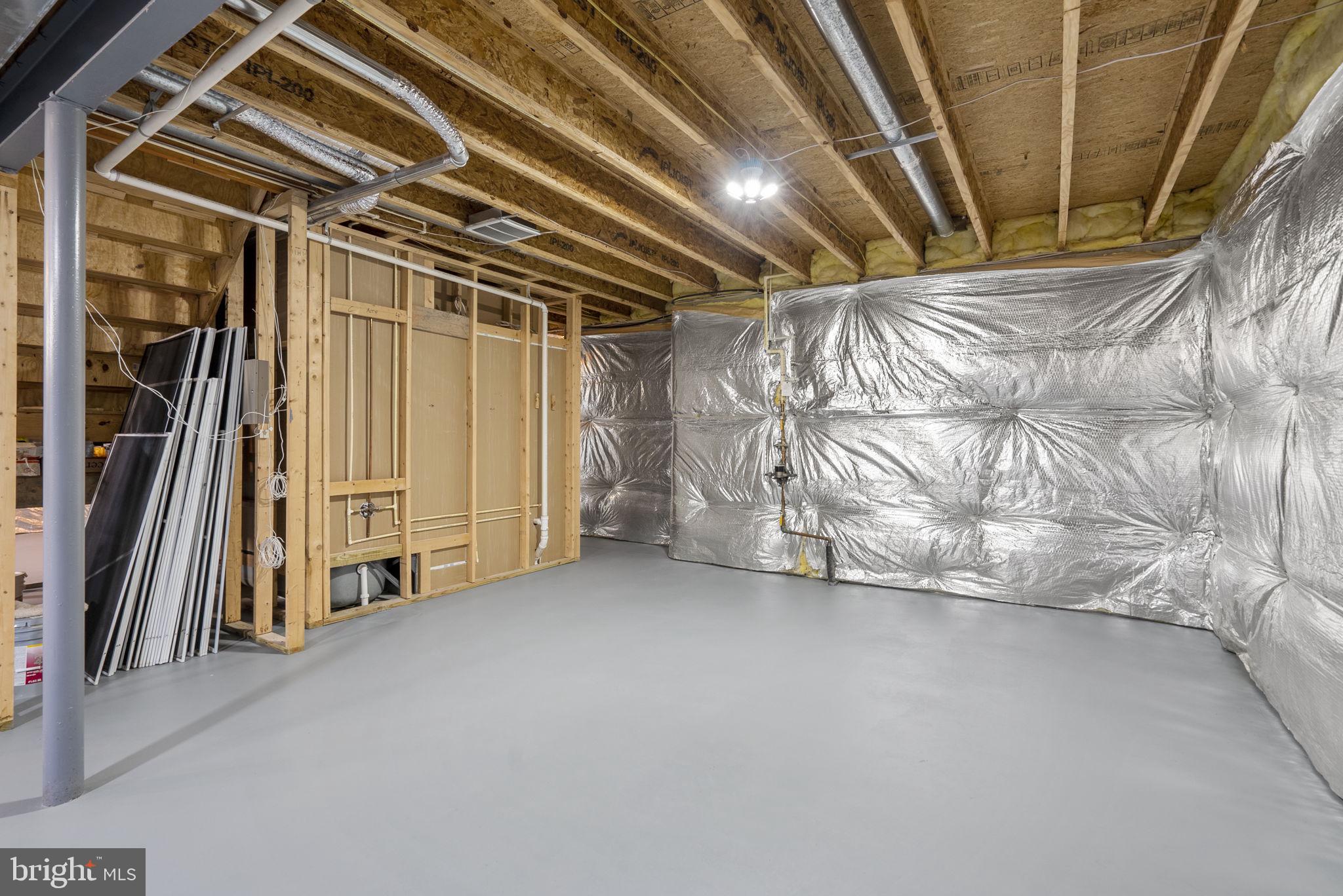 14421 Ashleigh Greene Road Boyds, MD 20841 - Photo 66 of 95 a view of an empty room with stairs