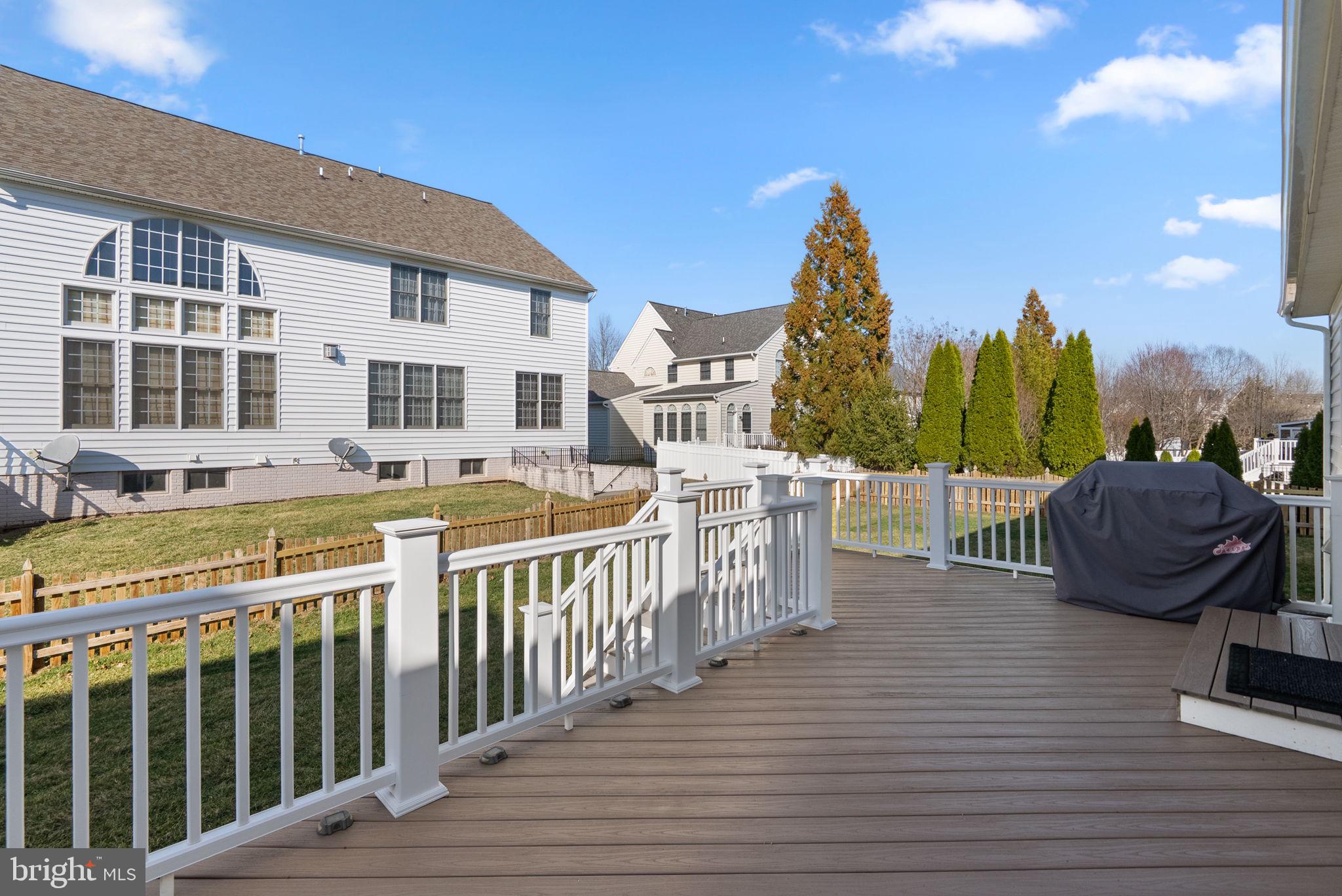 14421 Ashleigh Greene Road Boyds, MD 20841 - Photo 68 of 95 a view of a house with wooden deck