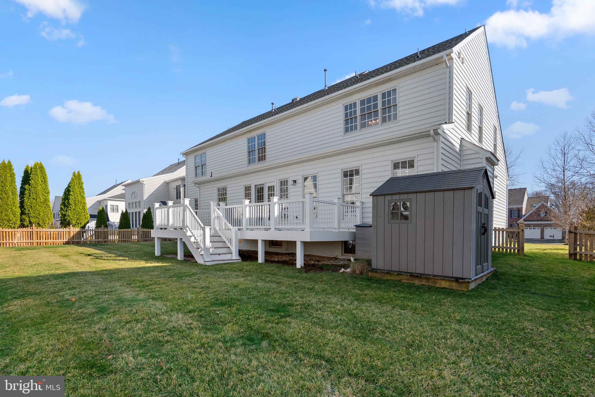 14421 Ashleigh Greene Road Boyds, MD 20841 - Photo 69 of 95 a view of a house with backyard and garden