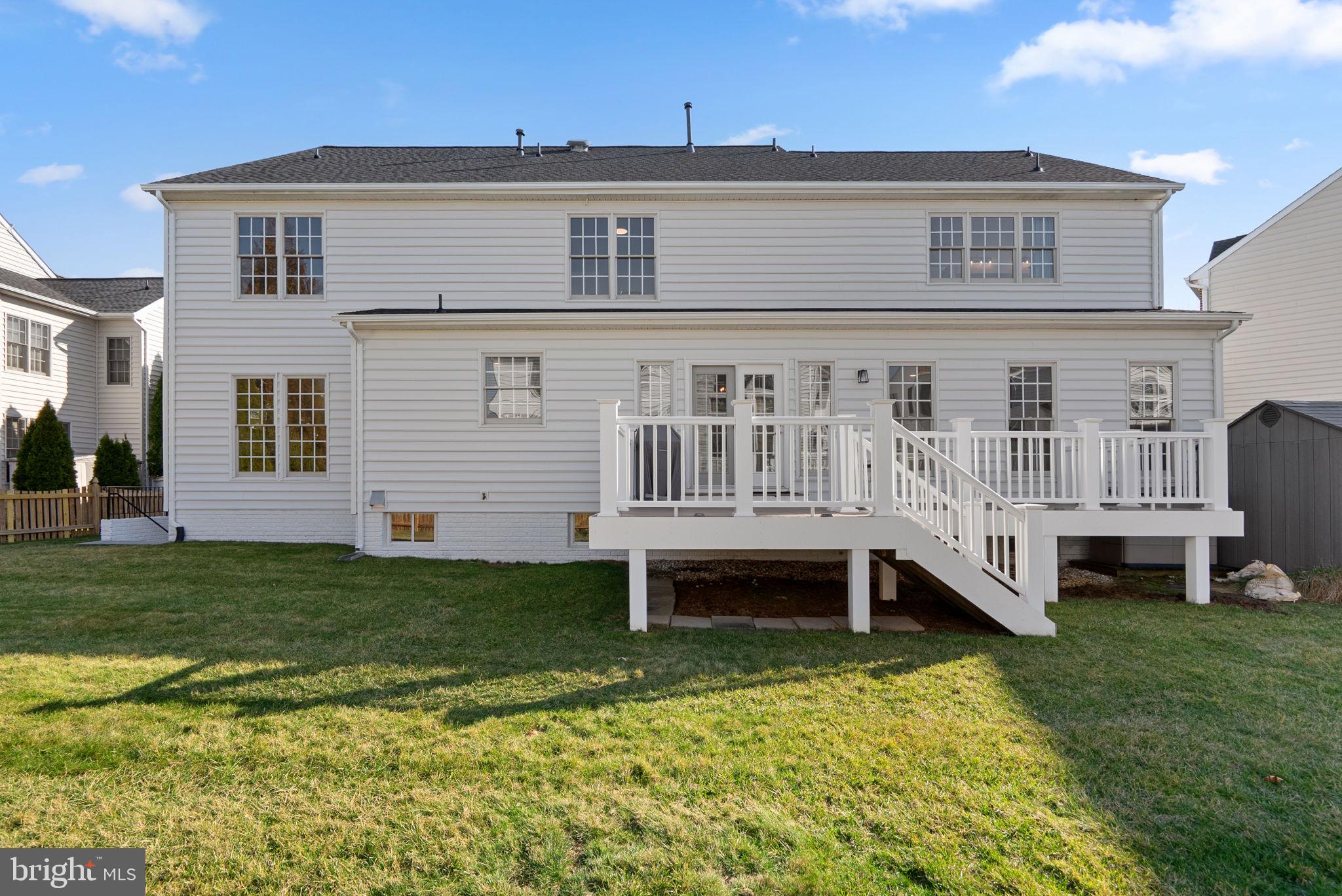 14421 Ashleigh Greene Road Boyds, MD 20841 - Photo 70 of 95 a view of a house with a backyard
