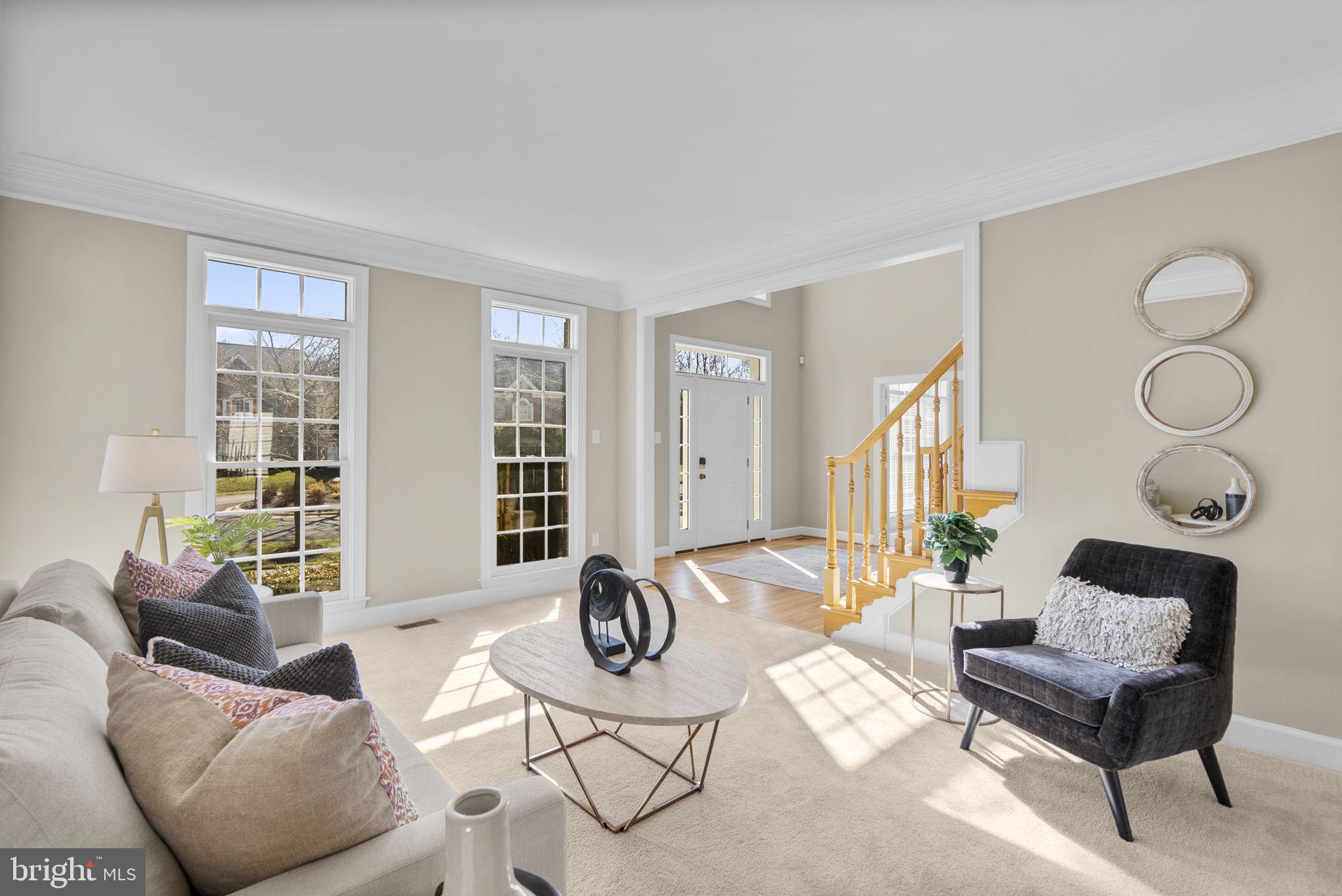 14421 Ashleigh Greene Road Boyds, MD 20841 - Photo 7 of 95 a living room with furniture and a window
