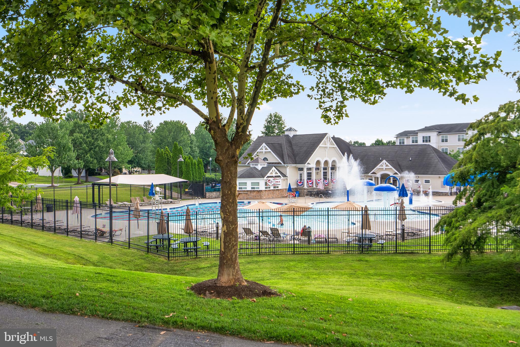 14421 Ashleigh Greene Road Boyds, MD 20841 - Photo 80 of 95 a view of a house with a big yard and large trees