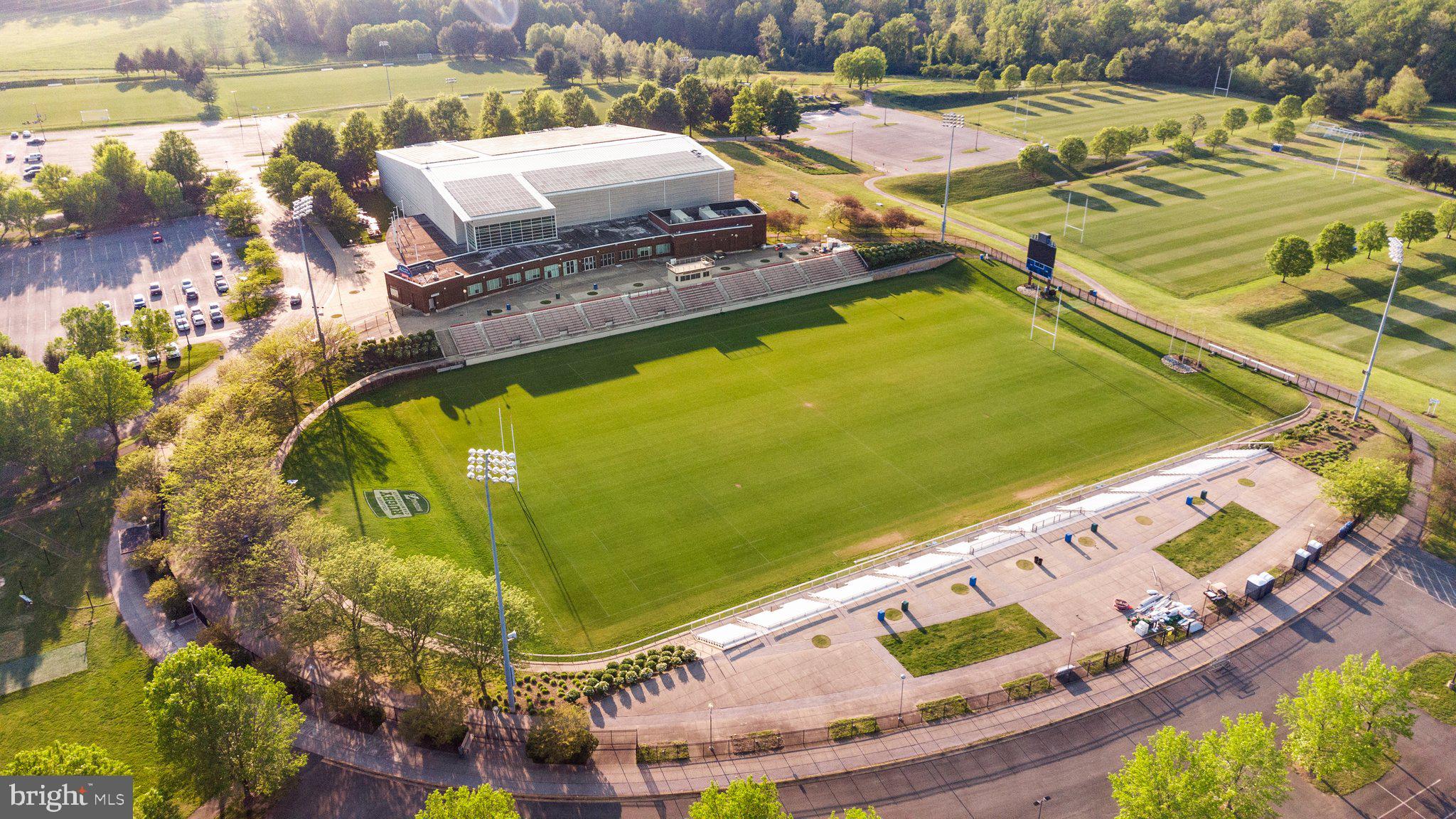 14421 Ashleigh Greene Road Boyds, MD 20841 - Photo 93 of 95 an aerial view of a pool patio swimming pool and outdoor seating
