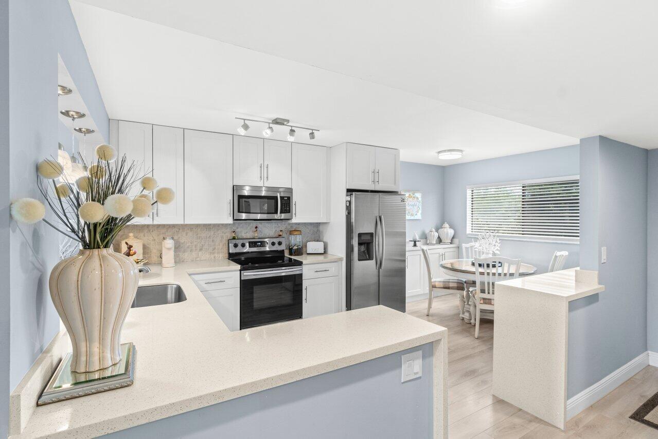 15075 Witney Road, Unit 312 Delray Beach, FL 33484 - Photo 1 of 33 004-15075WitneyRoad-312-DelrayBeach-FL-3