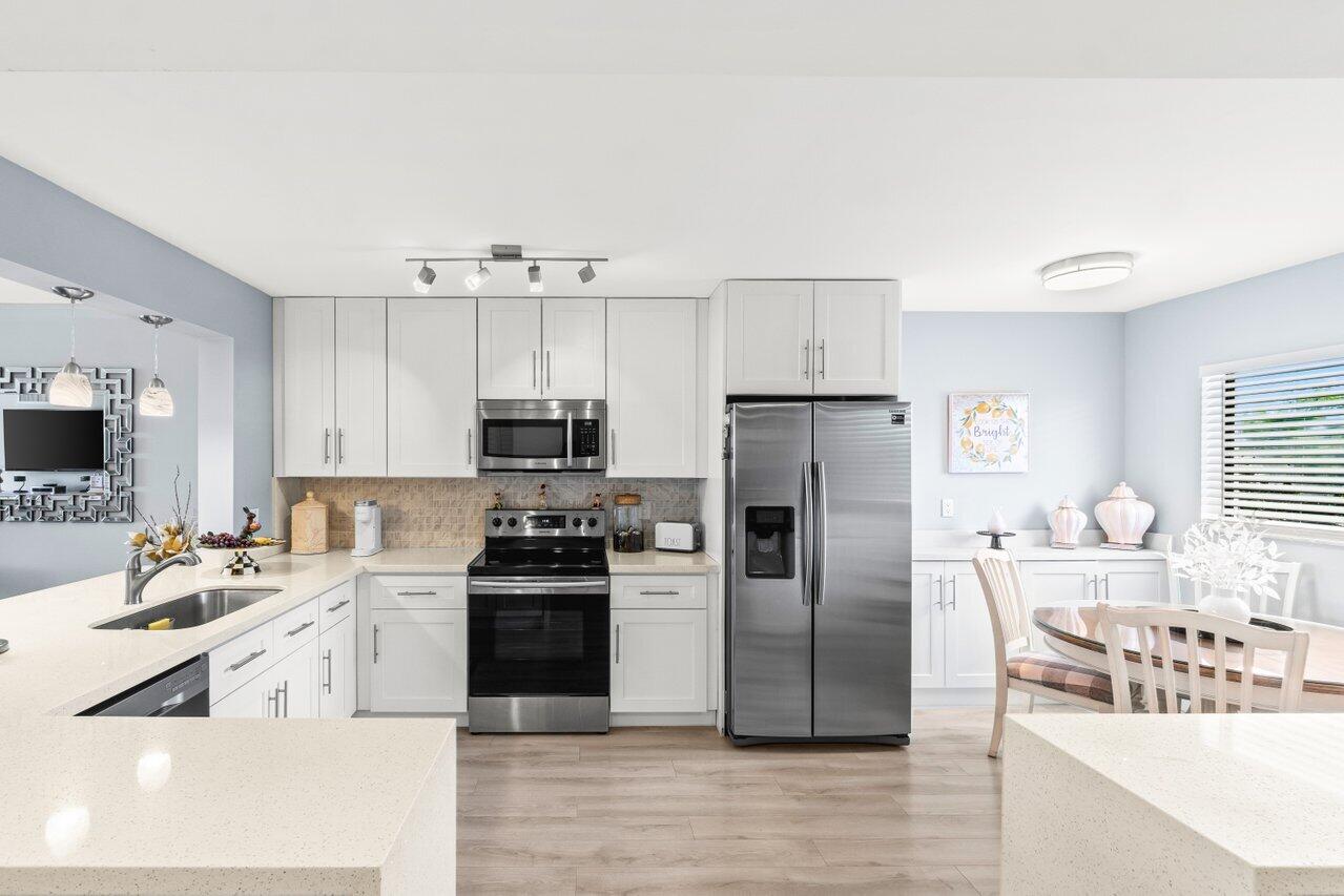 15075 Witney Road, Unit 312 Delray Beach, FL 33484 - Photo 2 of 33 005-15075WitneyRoad-312-DelrayBeach-FL-3