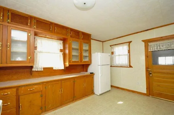 a bathroom with a sink and a window