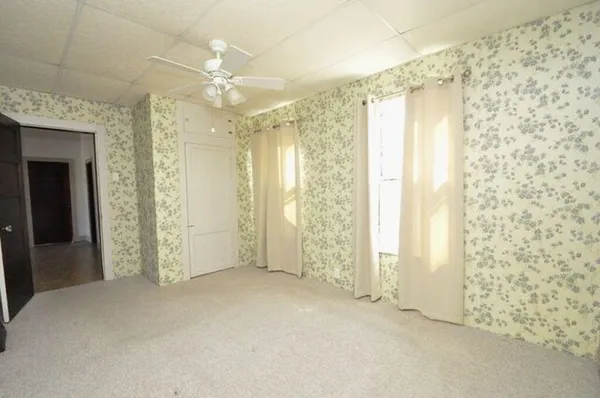 a bathroom with a shower and a tub