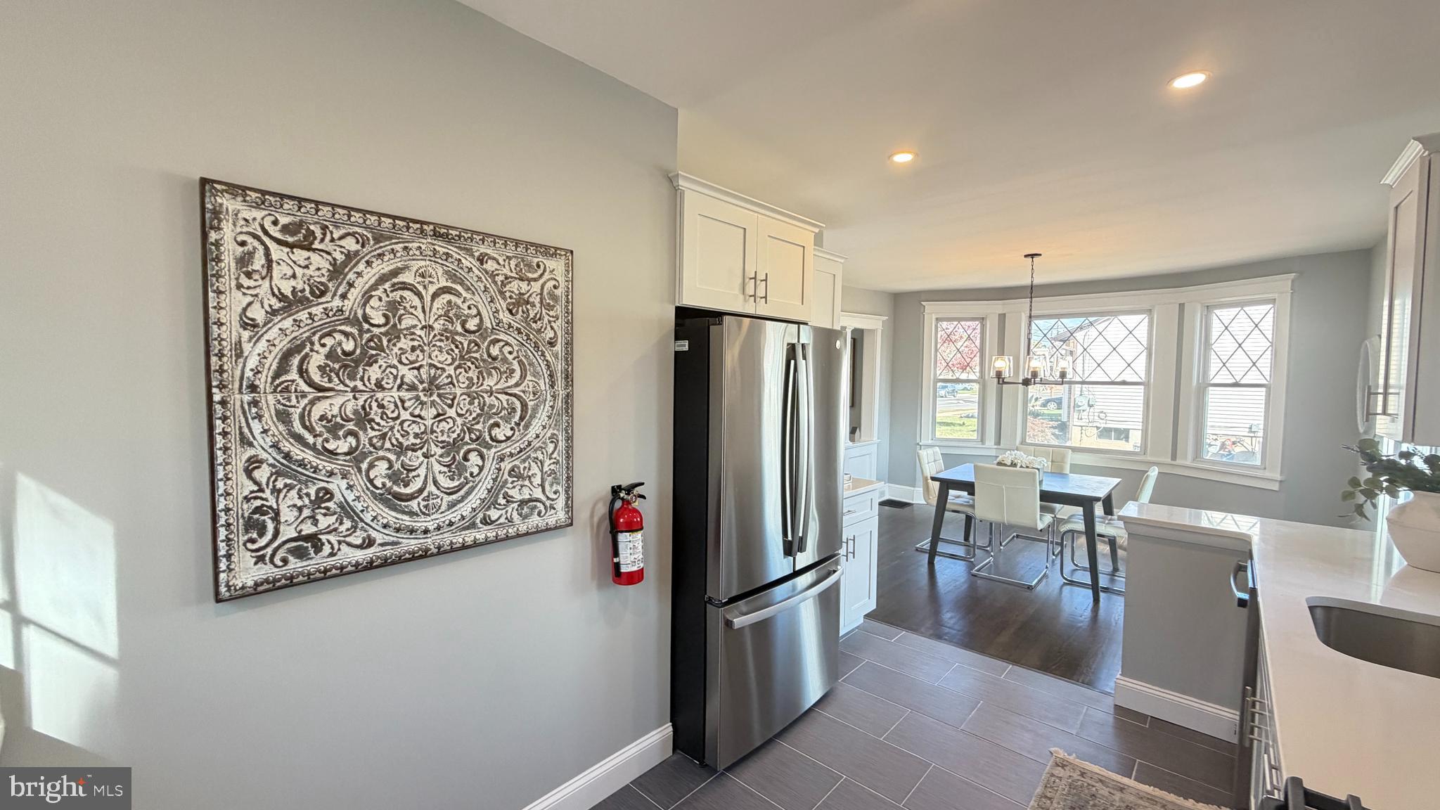 718 Bordentown Road Burlington, NJ 08016 - Photo 15 of 30 a kitchen with stainless steel appliances a refrigerator a stove and white cabinets