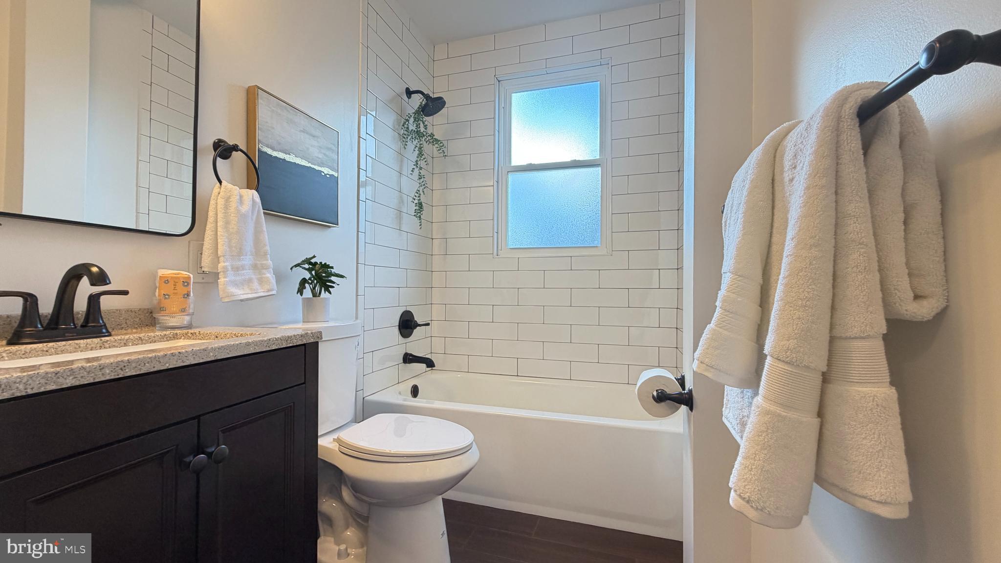 718 Bordentown Road Burlington, NJ 08016 - Photo 16 of 30 a bathroom with a sink a toilet and shower
