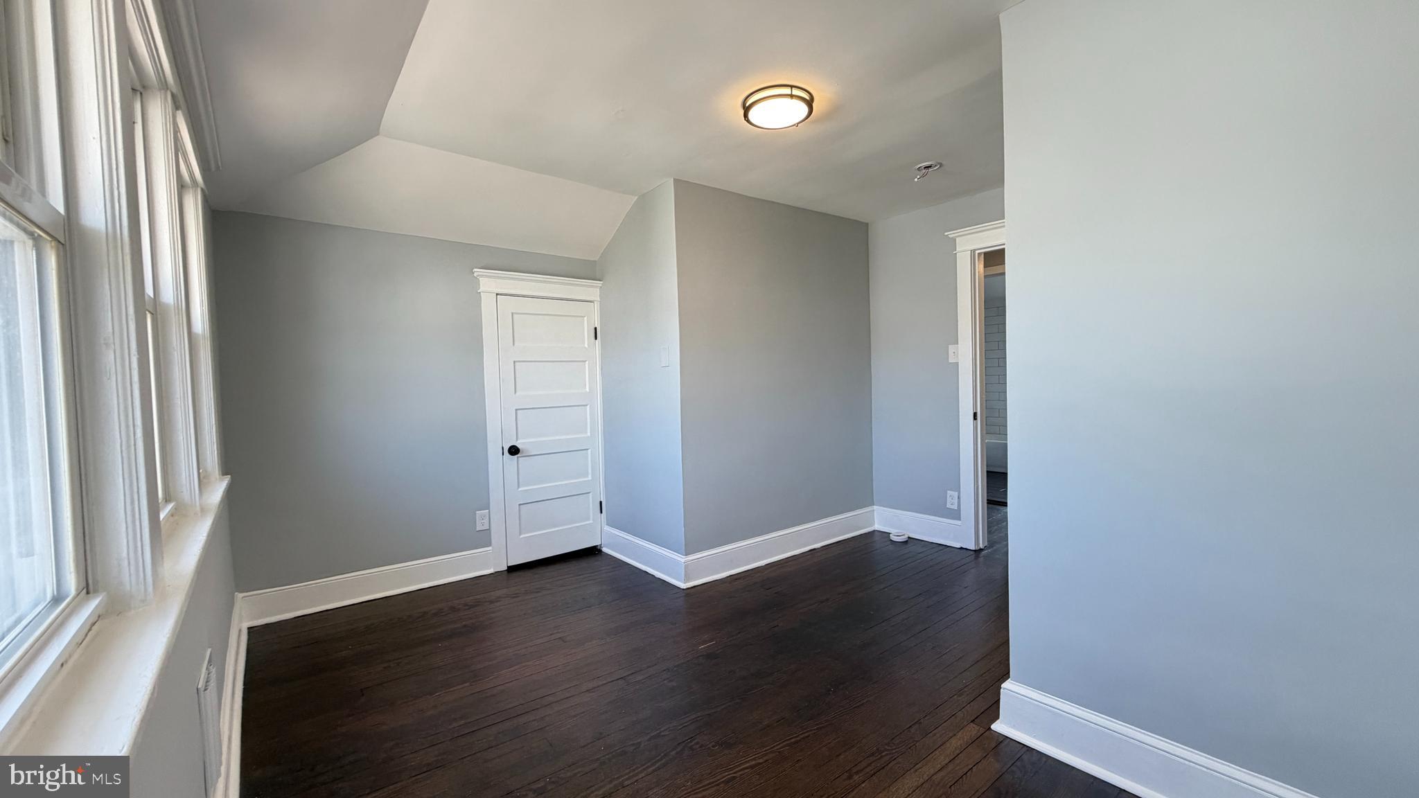 718 Bordentown Road Burlington, NJ 08016 - Photo 25 of 30 an empty room with wooden floor and windows