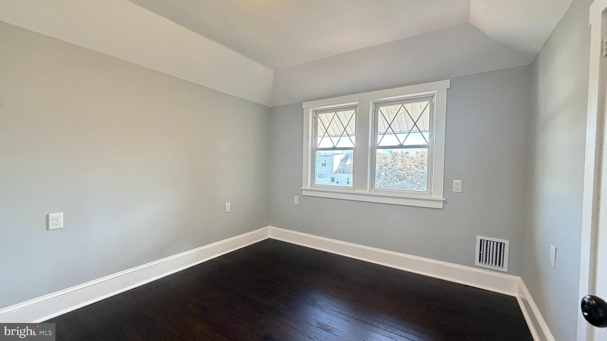 718 Bordentown Road Burlington, NJ 08016 - Photo 26 of 30 a view of a room with wooden floor and windows