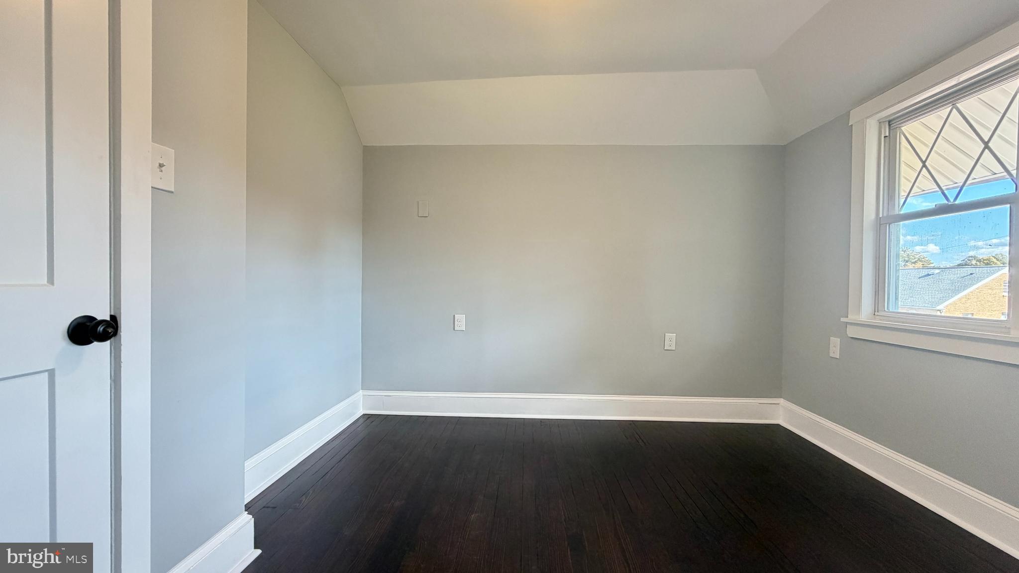 718 Bordentown Road Burlington, NJ 08016 - Photo 28 of 30 a view of an empty room with wooden floor and a window