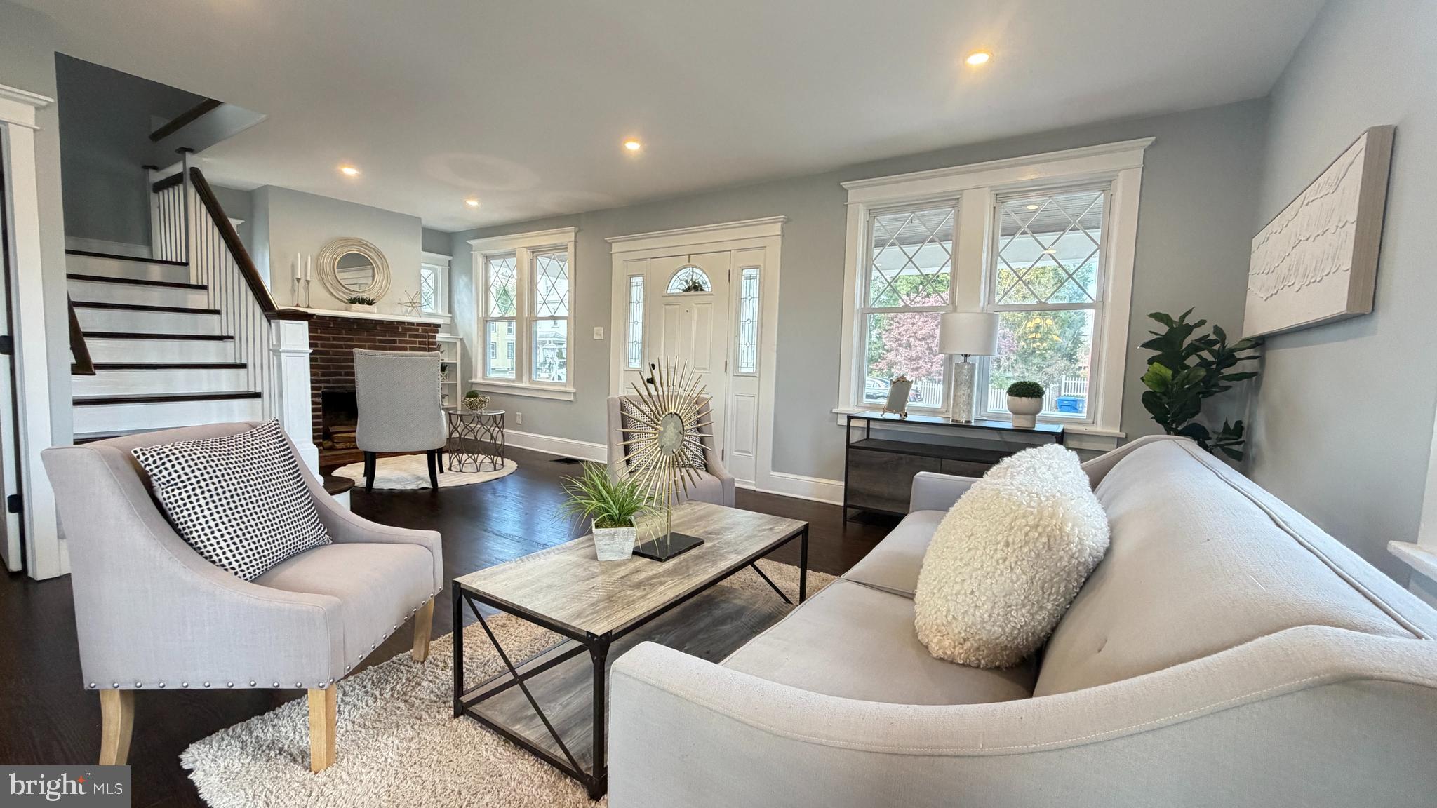 718 Bordentown Road Burlington, NJ 08016 - Photo 4 of 30 a living room with furniture and a fireplace