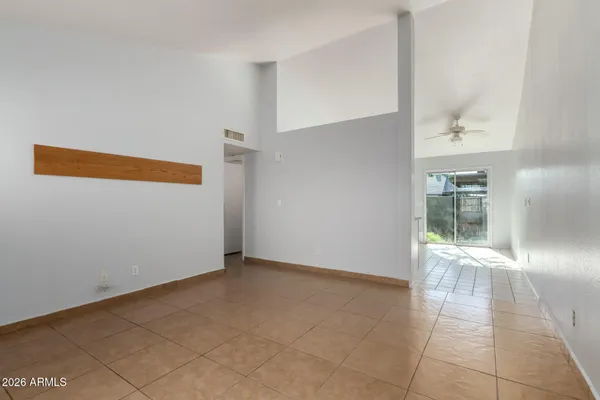 a kitchen with a stove a sink and a microwave
