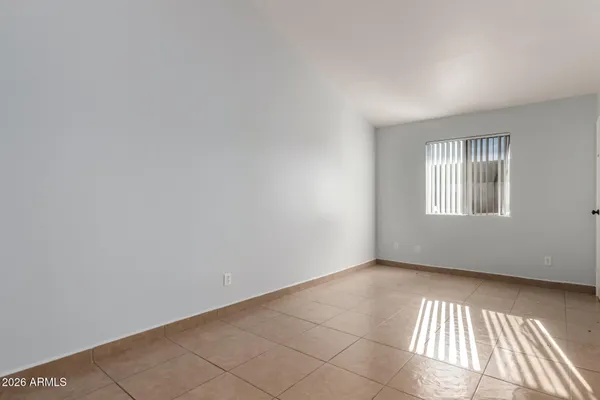 a view of a room with an entryway