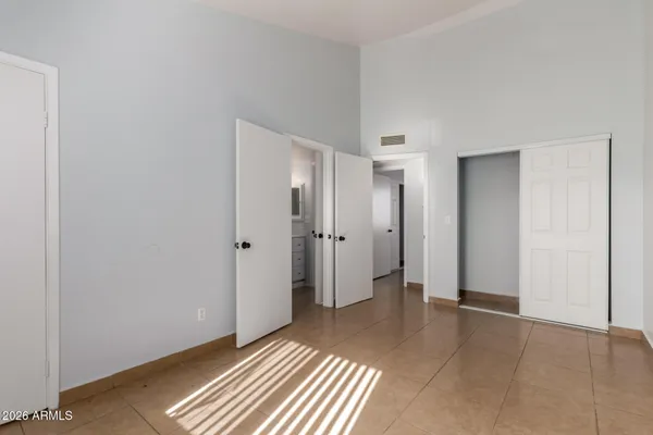 an empty room with windows