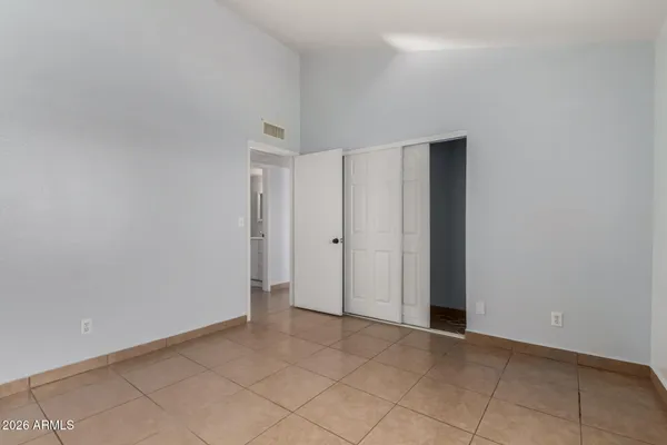 a view of a backyard of the house