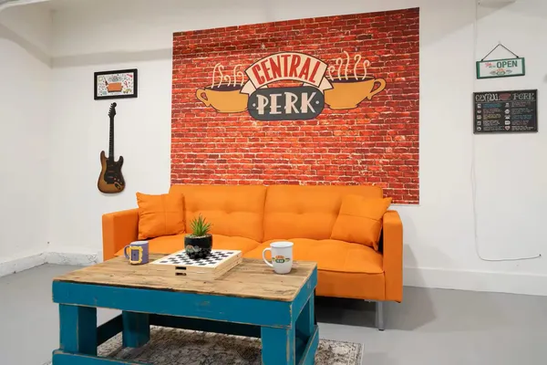 a reading room with table and chair