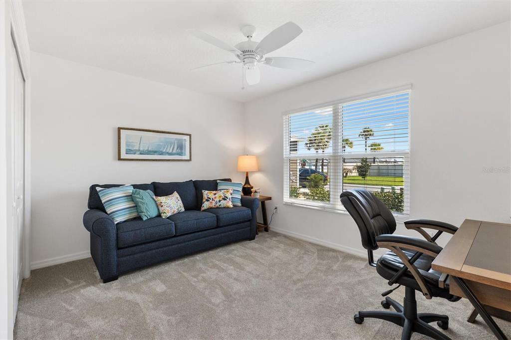 6767 Mary Loop The Villages, FL 34762 - Photo 16 of 26 a living room with furniture and a window