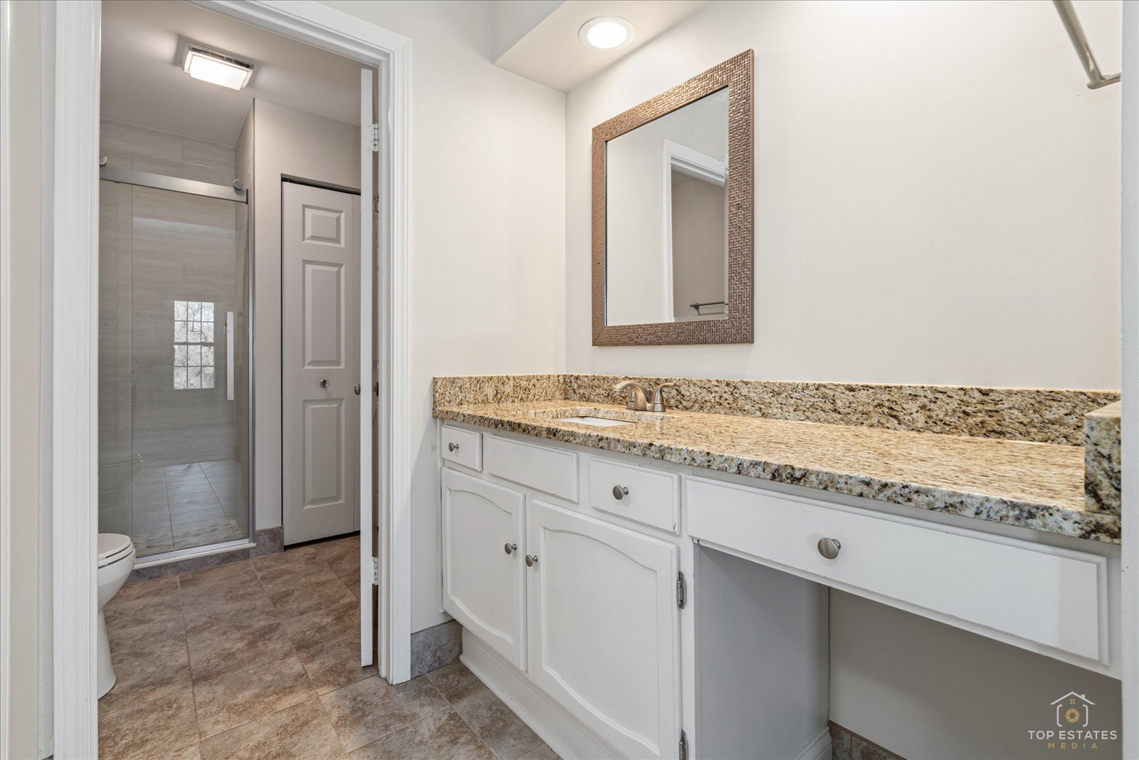 1427 Sutton Court, Unit 1427 Vernon Hills, IL 60061 - Photo 16 of 27 a bathroom with a granite countertop sink and a mirror