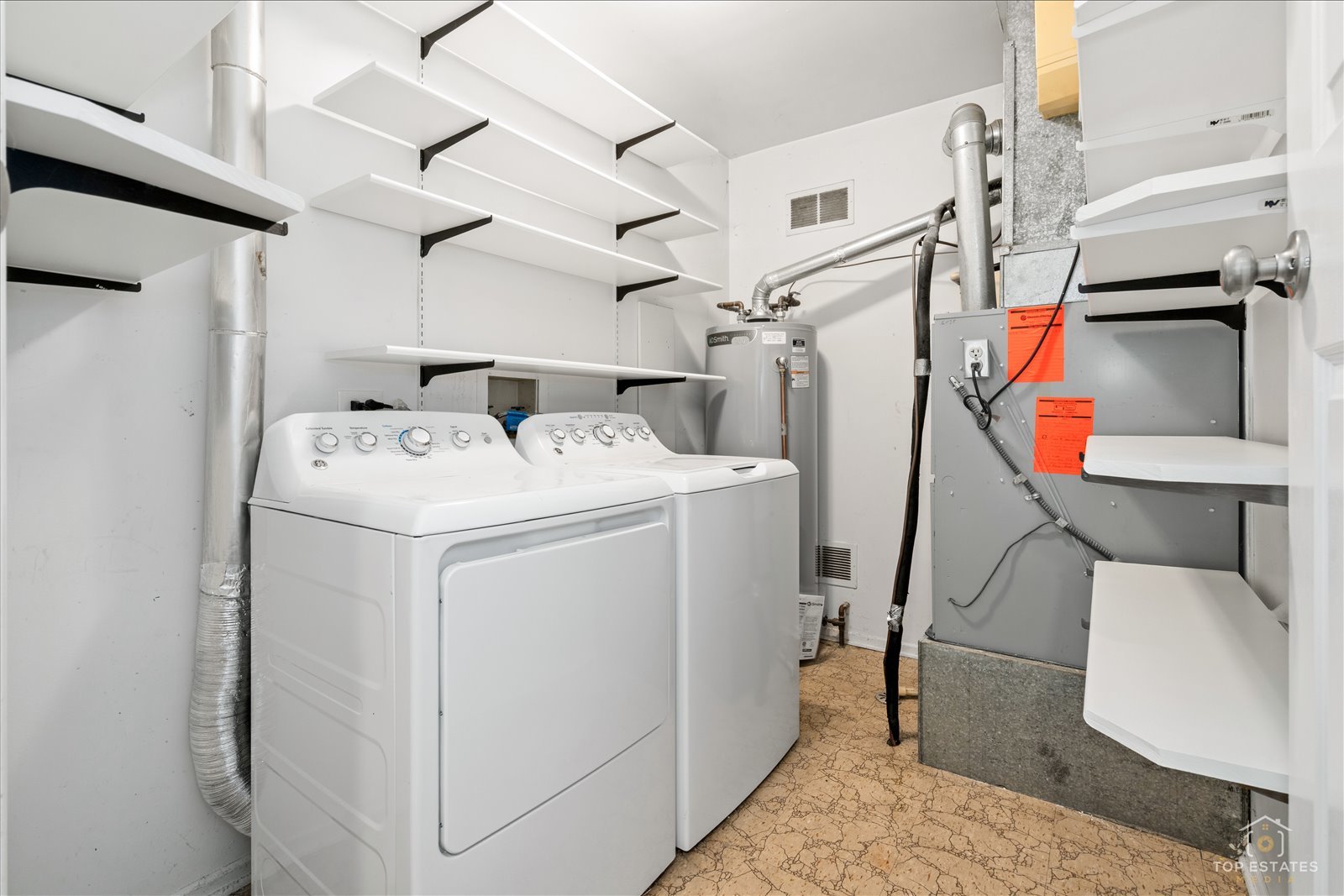 1427 Sutton Court, Unit 1427 Vernon Hills, IL 60061 - Photo 23 of 27 a utility room with dryer and washer