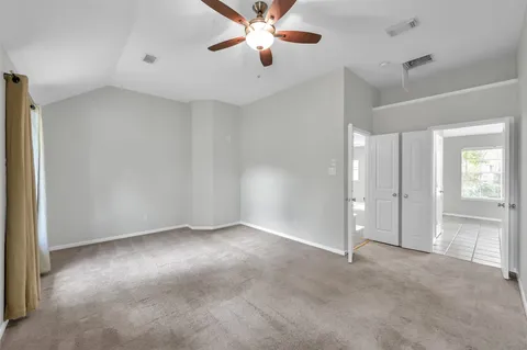 a view of a storage & utility room with closet