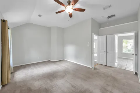 a view of a storage & utility room with closet