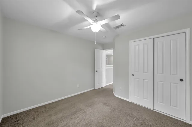 an empty room with a bathroom