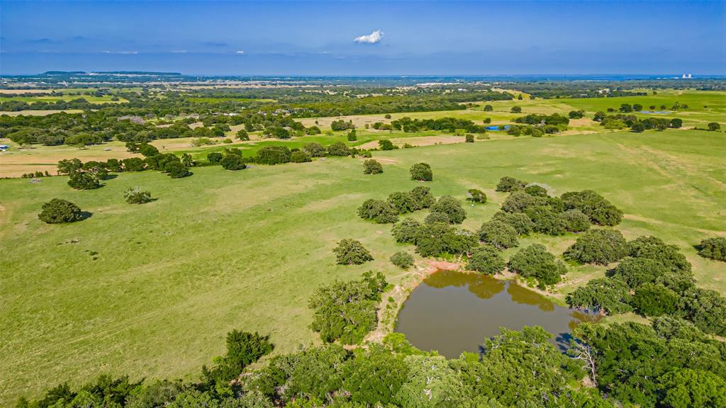 7601 Panther Branch Road Tolar, TX 76476 - Photo 4 of 26 a view of an ocean and a yard