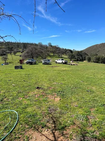 a view of a field with an outdoor space