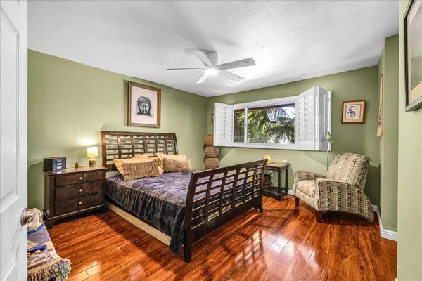 a bed room with a bed and a couch