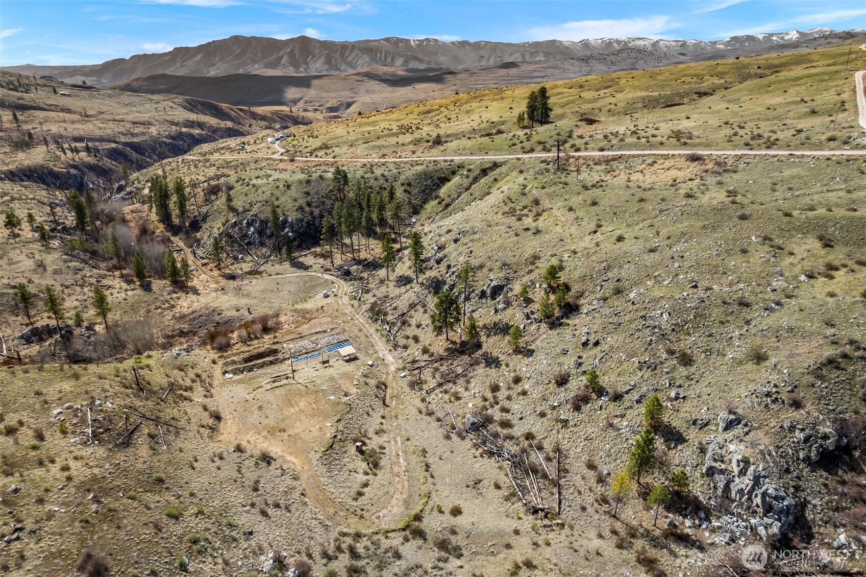 576 Indian Dan Canyon Road Brewster, WA 98812 - Photo 13 of 18 a view of a mountain with an outdoor space