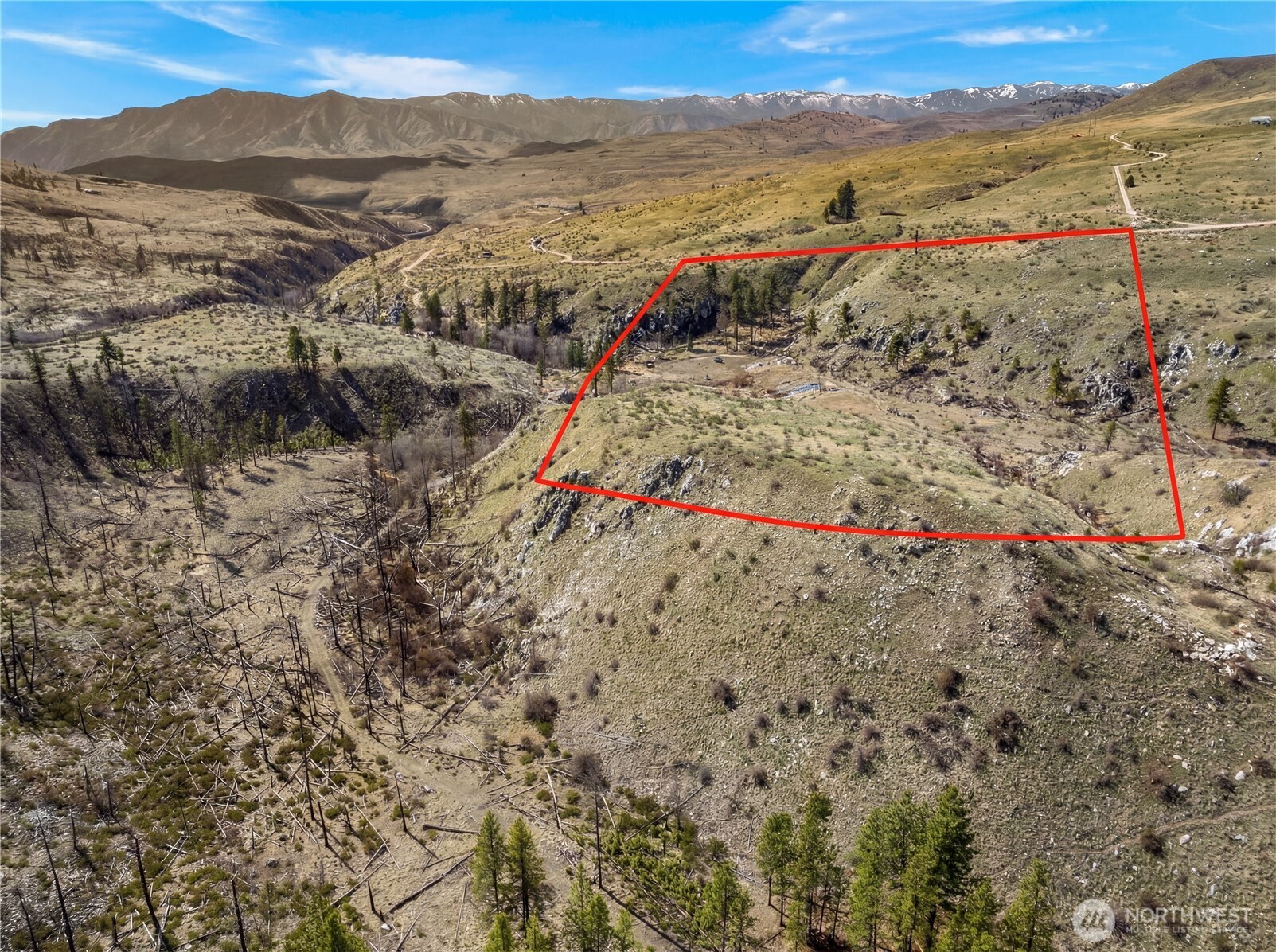 576 Indian Dan Canyon Road Brewster, WA 98812 - Photo 4 of 18 a view of an ocean with a mountain