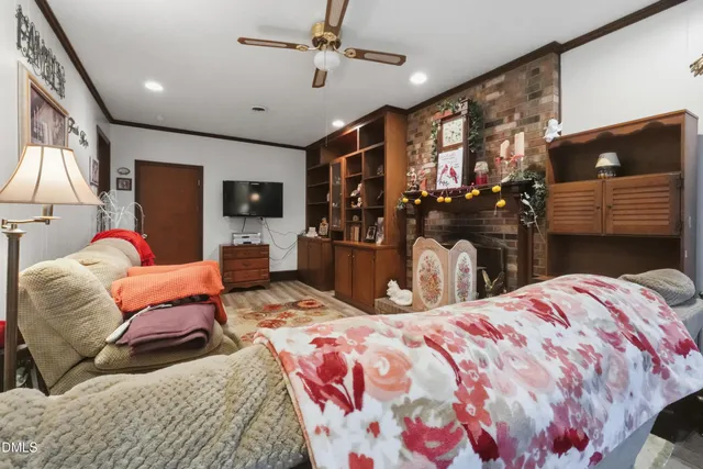 a view of a garden with a house in the background