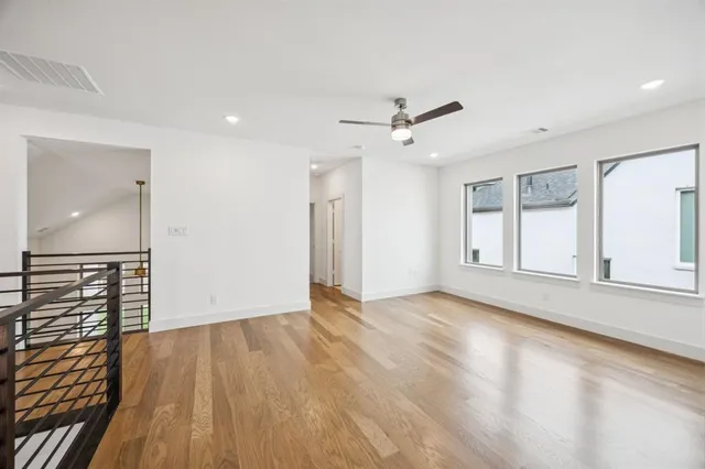 a bathroom with a sink a shower and a mirror