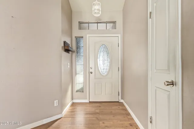 a view of door with washer and dryer