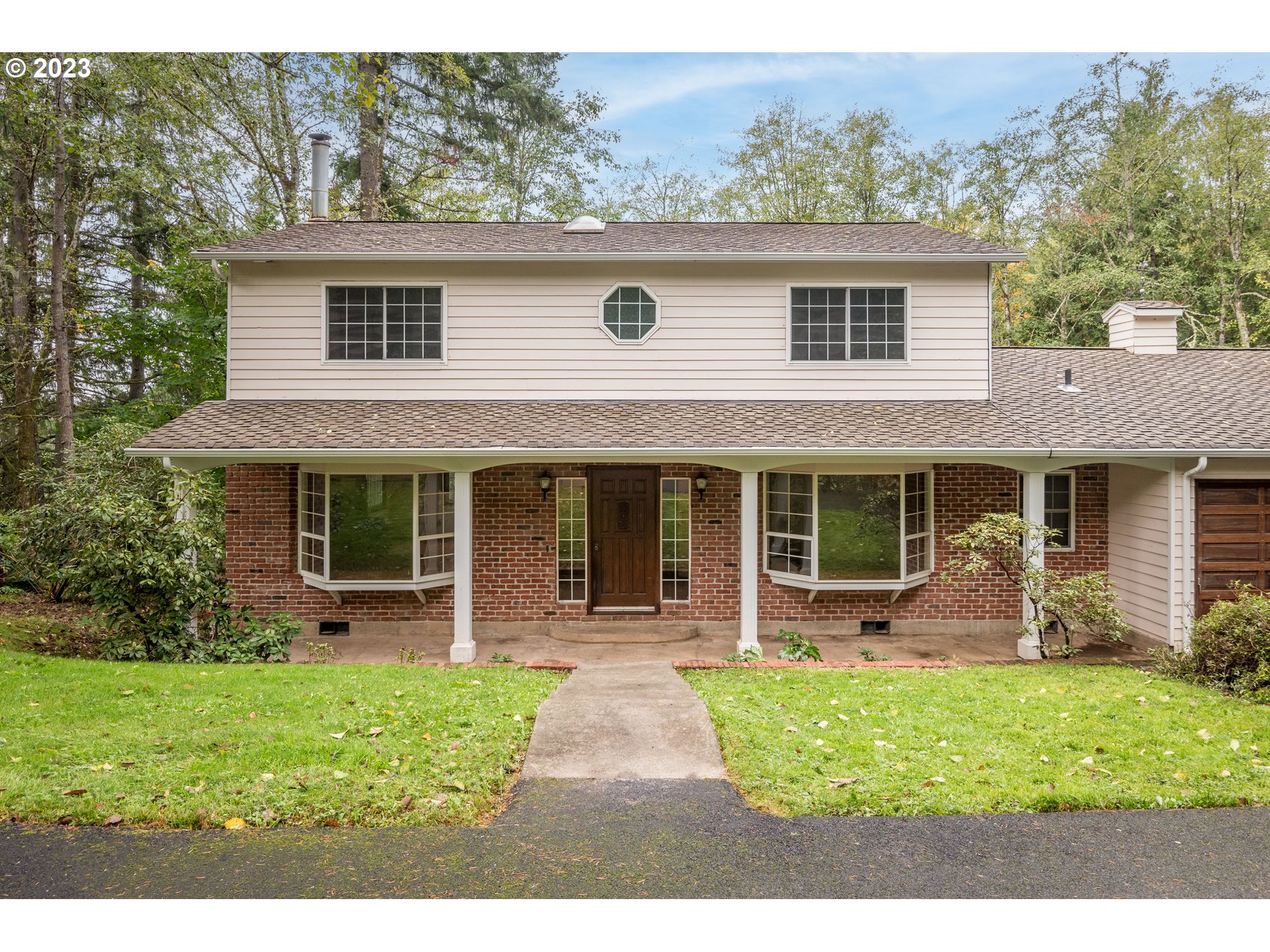 234 Walker Road Kelso, WA 98626 - Photo 35 of 35 a front view of a house with garden