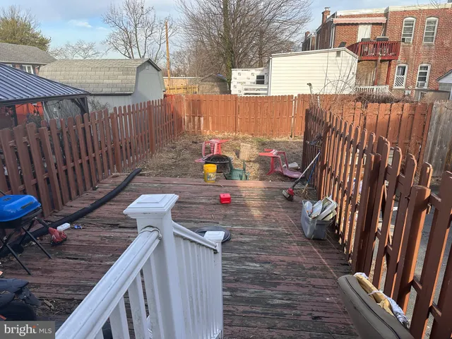 a view of a deck with two chairs and a table