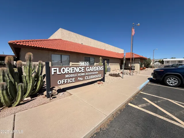 a view of a street with sitting area