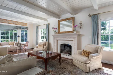 a view of livingroom with furniture and window