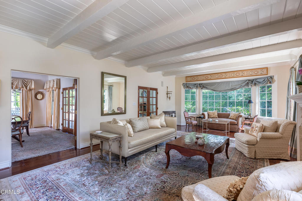 3121 Monterey Road San Marino, CA 91108 - Photo 15 of 77 a living room with furniture wooden floor and a table