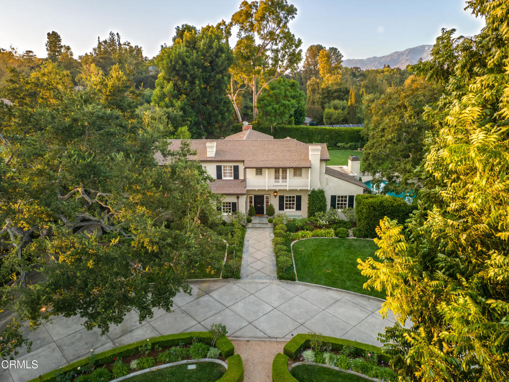 3121 Monterey Road San Marino, CA 91108 - Photo 2 of 77 a view of a house with a yard and garden