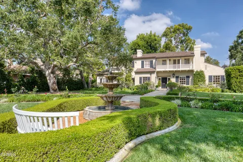 a view of a bench in a garden