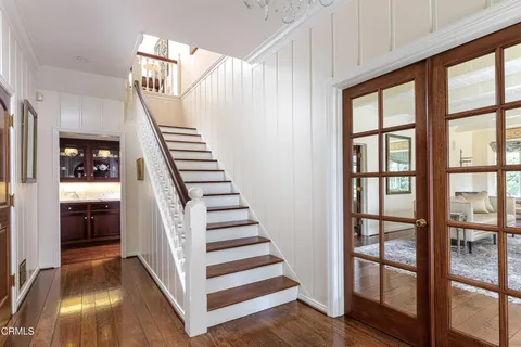 a view of a livingroom with furniture and windows